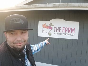 Chef Shawn Tibbitts visiting a local farm as part of Tibbitts @ Fern Hill’s connection to Pacific Northwest ingredients and community food systems.