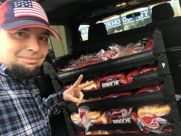 (Chef Shawn Tibbitts)Unloading essential supplies and fresh bread to make sure everyone gets a full plate.