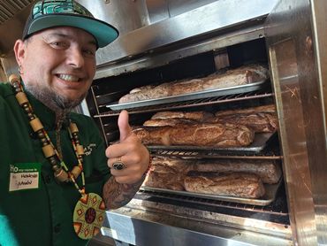 Chef Shawn showing off the massive amount of freshly baked goods ready for the holiday feed.