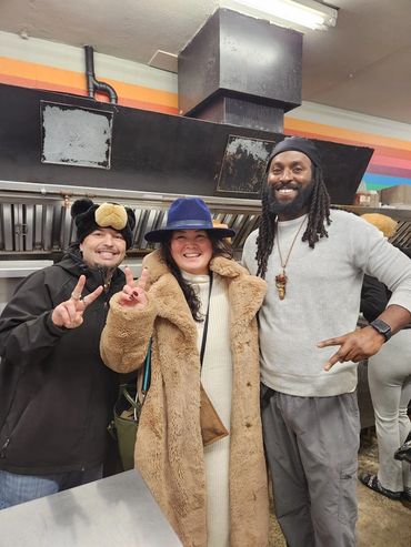 Chef Jan Parker, Buddy from Buddy’s Chicken and Waffles, and Chef Shawn Tibbitts during a Tacoma food collaboration.