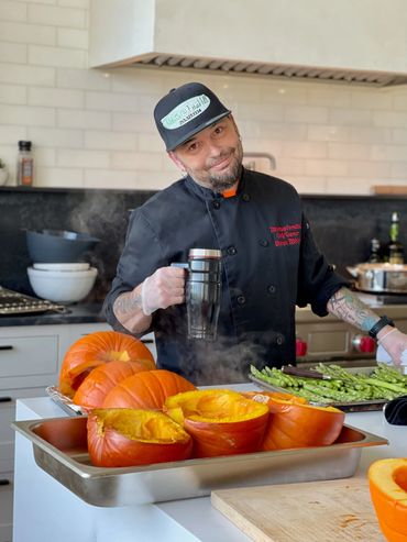Chef Shawn Tibbitts cooking a private dinner in a guest’s home through the Tibbitts @ Fern Hill private dining experience