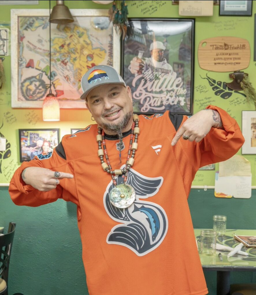 Chef Shawn Tibbitts at Tibbitts @ Fern Hill in a Seattle Kraken jersey for Indigenous Night.